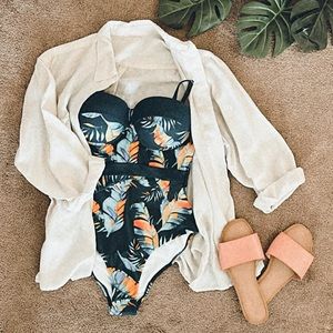 Adorable Cupshe waist cinching one piece with padded cups!